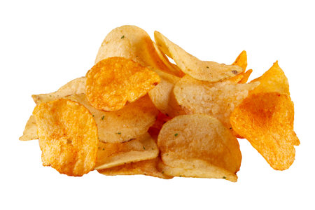 Heap of potato chips isolated on white background. Organic and all-natural delicious snackの写真素材