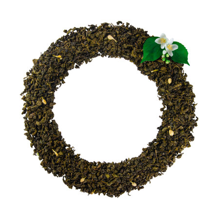Mockup of dried tea leaves and fresh jasmine flowers shaped in round Frame isolated on white background with clipping pathの写真素材