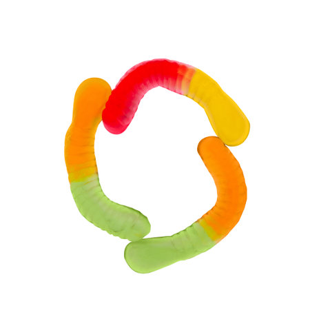 Letter O made of multicolored gummi worms and isolated on pure white background. Food alphabet concept. One letter of the set of sweet food font easy to stackingの写真素材