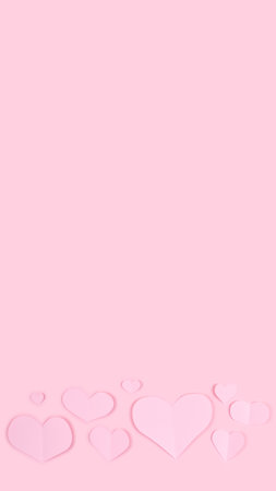 Pastel pink background with pink paper hearts applique for Valentine's Day bannerの写真素材