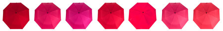 Set of different red colors umbrellas isolated on white background. Top view.の写真素材