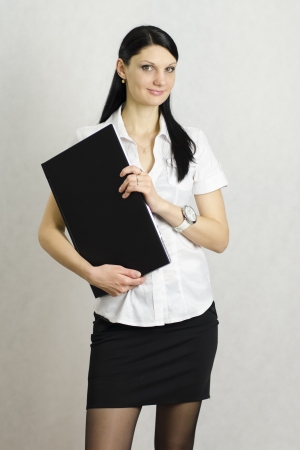 Business girl with a laptopの写真素材