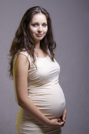 Portrait of pregnant girls in the Studioの写真素材