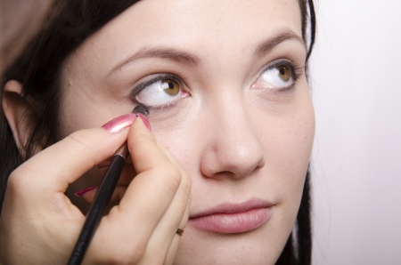  Makeup artist in the process of makeup colors eyelashes modelの写真素材