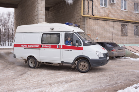 Volgograd, Russia - January 24, 2016: An ambulance calls in the courtyard of a multistory apartment houseのeditorial素材