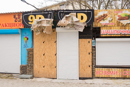 Sukko, Russia - March 15, 2016: Closed during the offseason 9D pavilion with advertising inscription on the seaside street at the Black Sea in the village of Sukkah, a suburb of Anapaのeditorial素材