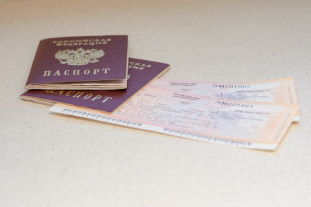 Volgograd, Russia - August 12, 2015: Passport of the citizen of the Russian Federation and train...