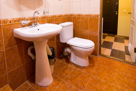 Bathroom in the hotel, washbasin and toiletの写真素材