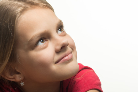 Close-up portrait of a girl who looked up