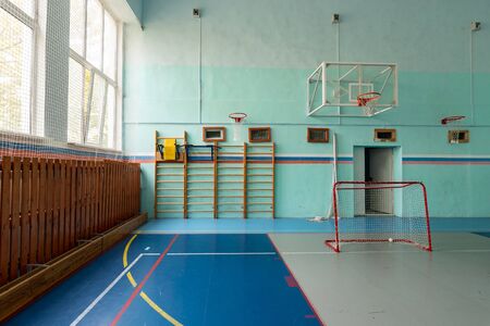 Anapa, Russia - October 5, 2019: Fragment of a sports hall with a ladder, a basketball hoop and small gatesのeditorial素材
