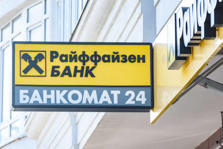 Anapa, Russia - March 20, 2020: Sign "Raiffeisen Bank. ATM 24" on the facade of the buildingのeditorial素材