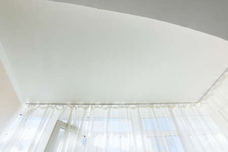 Stretch ceiling in a glazed loggia in an apartment buildingの写真素材