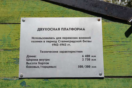 Volgograd, Russia - August 26, 2019: Information plate on the exhibit Two-axle platform for...