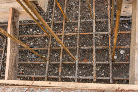 Additional reinforcement of the crosshairs of the strip foundation with metal reinforcementの写真素材
