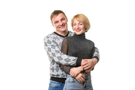 Portrait of smiling couple in casual clothes, isolated on white backgroundの写真素材