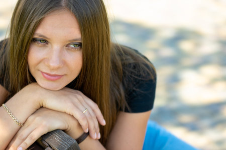 Close-up portrait of a beautiful girl of Slavic appearance, the girl has a thoughtful lookの写真素材