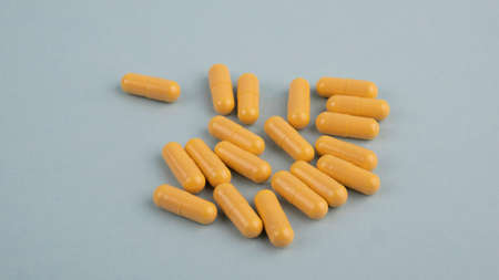Pills. Capsules. Vitamins. Colored pills. A bunch of tablet pillsの写真素材
