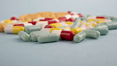 Pills. Capsules. Vitamins. Colored pills. A bunch of tablet pillsの写真素材