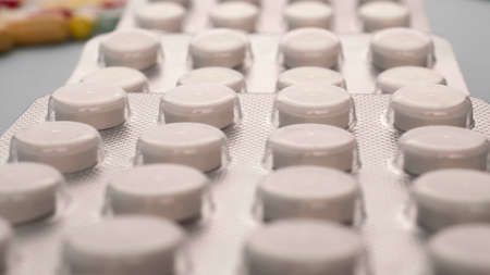 Pills. Capsules. Vitamins. Colored pills. A bunch of tablet pillsの写真素材