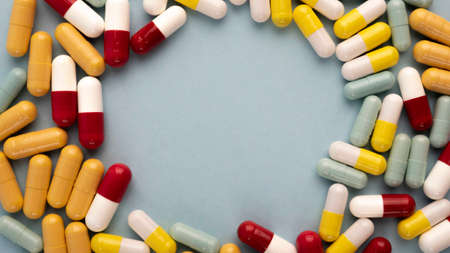Pills. Capsules. Vitamins. Colored pills. A bunch of tablet pillsの写真素材