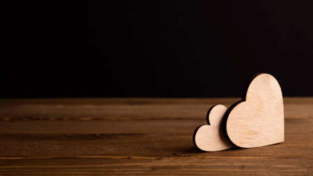 background with wooden hearts, place for textの写真素材