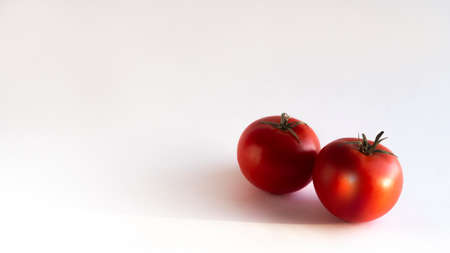 a ripe orange isolated on a yellow background, on a green background, on a red background, on a combined backgroundの写真素材