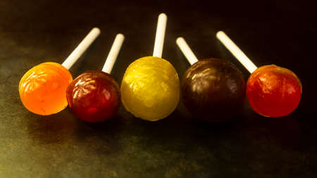 Composition of colorful jelly candies on white background.