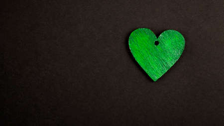 Hand offer medical shield on green background.の写真素材