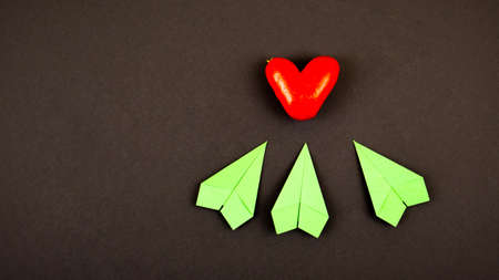 Valentines day concept. Handmade red hearts on a dark background. With place for your text.の写真素材