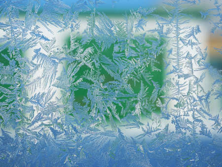 Abstract view of frost on the window surface. Blue crystal frosty texture. Cold winter background.の写真素材