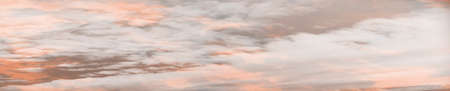 Abstract colorful background. Blue purple orange sky at sunset background. Sunset in the clouds.