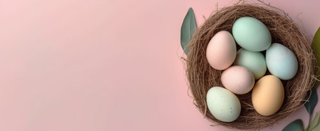 Pastel Easter eggs on blue background top view. Springtime holidays concept with copy space. Top viewの素材