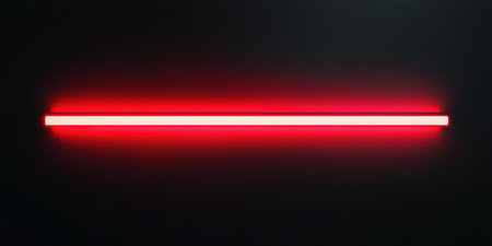 Red neon light tube shining on black backgroundの素材