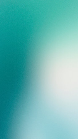 Abstract background featuring a soft gradient of blue and green tones, providing a calming visual effect perfect for creative design projects and digital use with copy spaceの写真素材