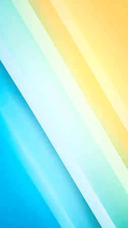 Vibrant abstract gradient background with smooth diagonal lines in blue, green, and yellow, ideal for creative design projects and digital applicationsの写真素材
