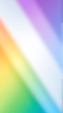 Abstract gradient background showing a blend of vibrant rainbow colors, creating a visually appealing and dynamic atmosphere for various design projects and creative usesの写真素材