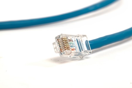 Blue Network Cable on White Isolated Backgroundの写真素材