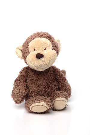 Brown Teddy Sitting on White Isolated Backgroundの写真素材