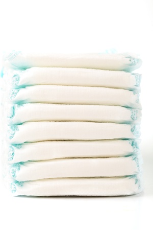 Stack Of Baby Diapers On White Isolated Backgroundの写真素材