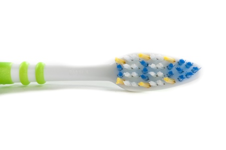 One Green Toothbrush on White Isolated Backgroundの写真素材