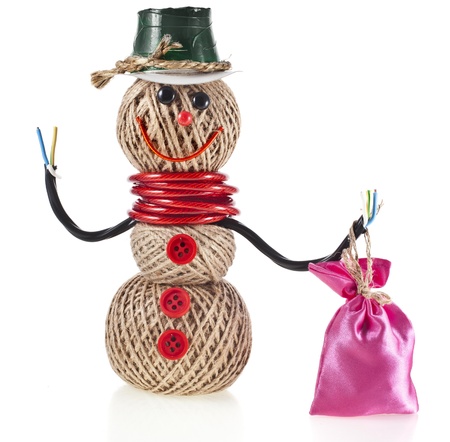 Happy Snowman made of yarn, rope, wire, tape with a bag of gifts isolated on white backgroundの写真素材