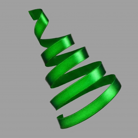 Christmas tree from green ribbon tape on gray backgroundの写真素材