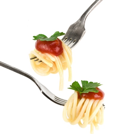 spaghetti pasta with tomato sauce on a fork isolated on white backgroundの写真素材