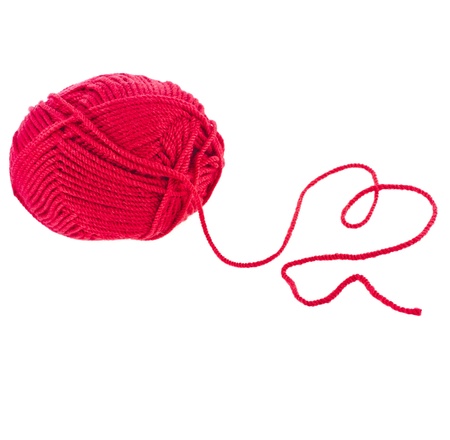 red yarn thread wit heart sign isolated on white backgroundの写真素材