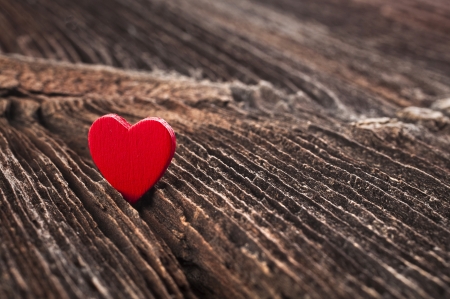 Love heart on break wood texture background, valentines day card conceptの写真素材