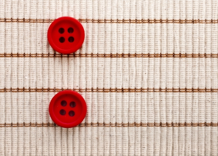 red buttons cotton fabric textureの写真素材