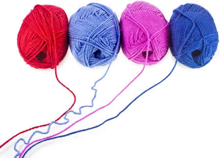 colored yarn thread isolated on white backgroundの写真素材