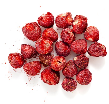 dried strawberries , isolated on a white backgroundの写真素材