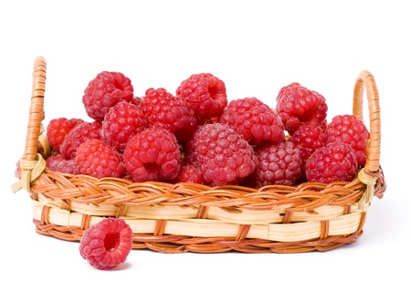 raspberry in a basket isolated on white background