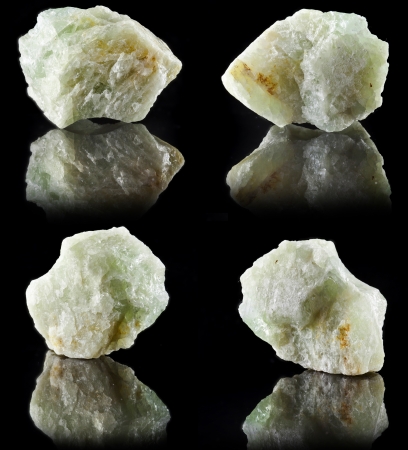 Collection set of Aquamarine in rock stone with reflection on black surface backgroundの写真素材